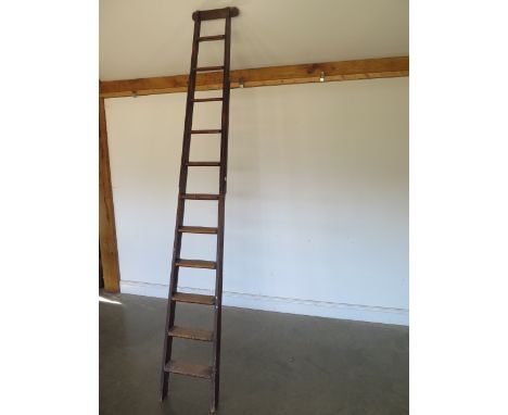 A Georgian pine eleven rung library ladder, 266cm H x 36cm W - removed from a Cambridge College 