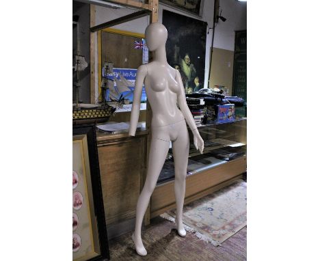 A female mannequin (missing one hand), shipping unavailable 