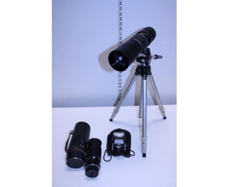 A Hanimex auto focus F=300mm 1:5.5 lens and tripod complete with a vintage Nikon light meter 