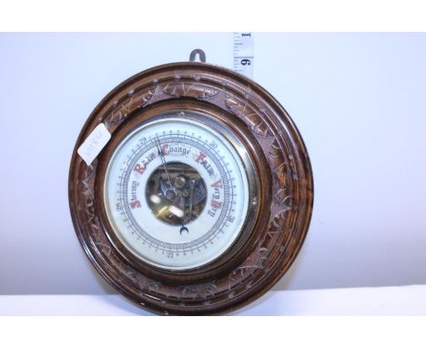 A oak cased vintage barometer 