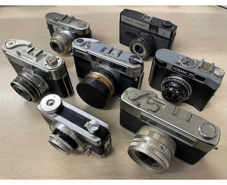 Seven vintage cameras, to include: Voigtlander Vito B; Cosmic Symbol; Cosmic 35; Yashica Minister III; LightOmatic V11395; Sa