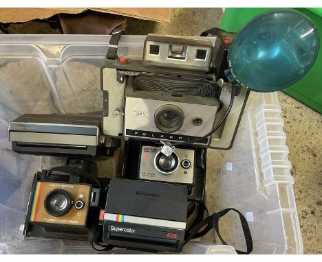 Five various polaroid cameras