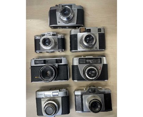 Seven vintage cameras to include: Agfa; Braun Super Paxette; Regular Sporting BC; Taron Vic; Coloxa; Pentona II; Franka (7)