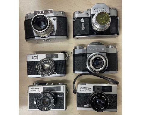 Six vintage cameras to include: EXA 1a; Zenit 3M; Konica CYCZeiss Ikon Contaflex; Ricoh 500G; Cosina Compact 35E (6)