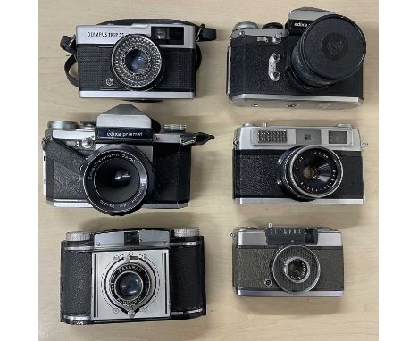 Six vintage cameras, to include: Olympus Trip 35; Edixa Prismaflex; Edixa Prismat; Olympus Pen-EE 157915; Rank Mamiya; Paxina