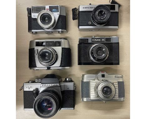 Six vintage cameras to include: Palmat Automatic; Olympus Trip 35; Cosmic 35; Praktica VLC 2 Blora Bella 44, One other west G