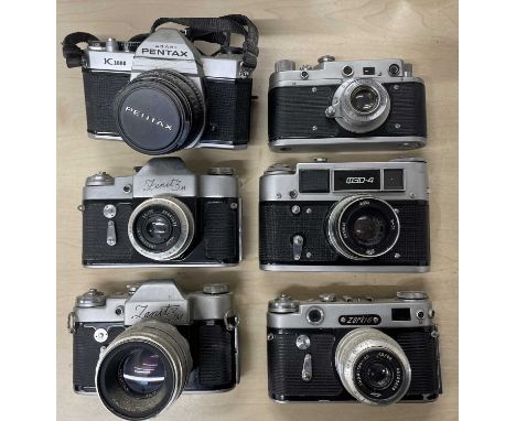 Six vintage cameras to include: Zopkuu C; Zorki 6; FED 4;  Zenit 3M (x2); Asahi Pentax