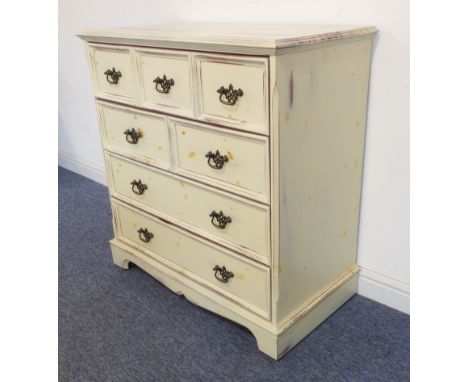 A modern painted shabby-chic-style chest: full-width top drawer over two half-width drawers and two further full-width drawer