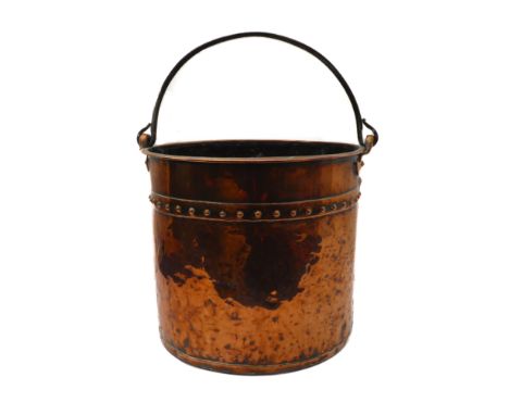 A 19th century cylindrical rivetted-copper coal bucket with iron swing-handle (35.5 cm diameter x 31.5cm high)Condition Repor