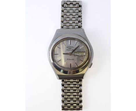 A gentleman's vintage steel-cased wristwatch with integral steel strap: the silver-coloured dial signed 'Rotary Automatic' an