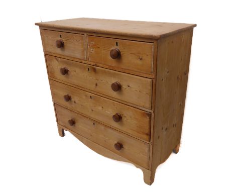 A good early 19th century pine chest: two half-width over three full-width graduated drawers with large inset brass escutcheo