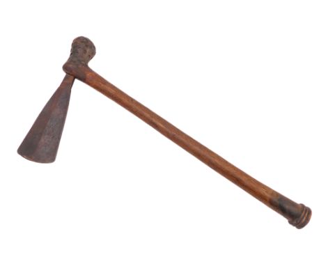 A tribal hatchet/axe: shaped blade into a turned hardwood handle with a bulbous top decorated with indented circles and a han