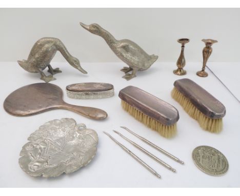 A selection of silver and silver-plated ornamental decorative wares and bijouterie to include:a silver-backed dressing table 