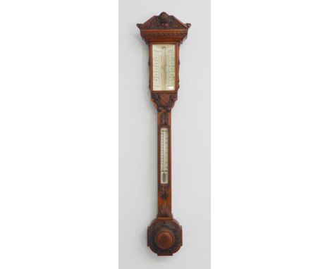 A fine 19th century carved-oak-cased barometer: ornate classical-style carved angular pediment with dogtooth-style carving;&n