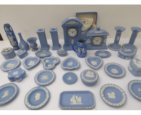 A large collection of 20th century Wedgwood pale-blue Jasperware to include:two mantle clocks; a boxed Edward VIII 1894-1972 