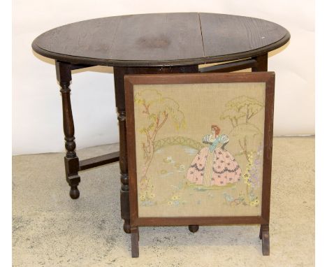 Oak drop leaf table (74 x 110 x 75cm)  together with a hand embroidered fire screen.