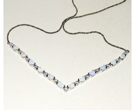 Good silver CZ and opal panelled necklace