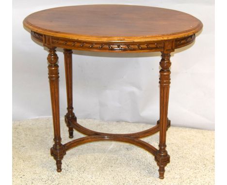 Mahogany oval lamp table on fluted turned legs 73 x 83 x 57cm