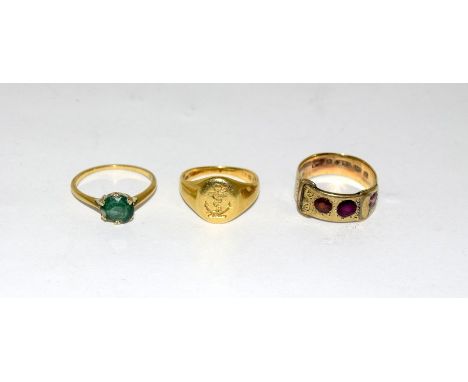 18ct gold emerald ring, 18ct gold signet ring and a 9ct gold ruby ring