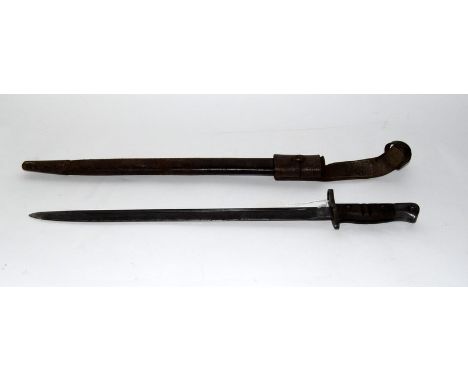 A WW1 British Enfield Pattern 1913 bayonet in its leather scabbard with leather frog. Made by Remington. Blade length 42cms