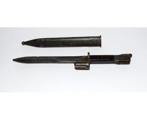 A Belgian FN FAL Type A knife bayonet in its steel scabbard. Blade length 20cms