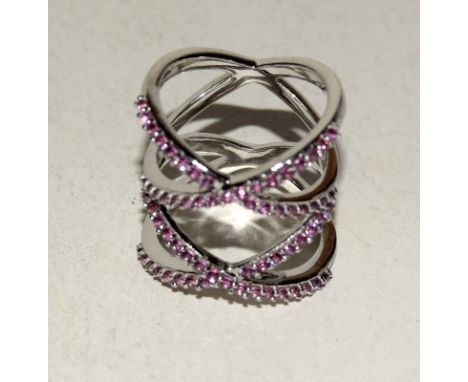 Silver fashion ring with Ruby coloured twist size N