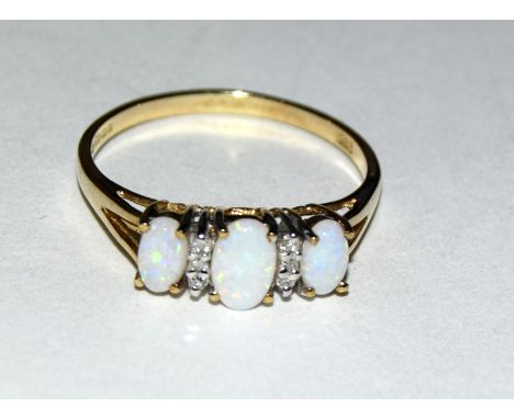 9ct gold ladies diamond and opal ring size N