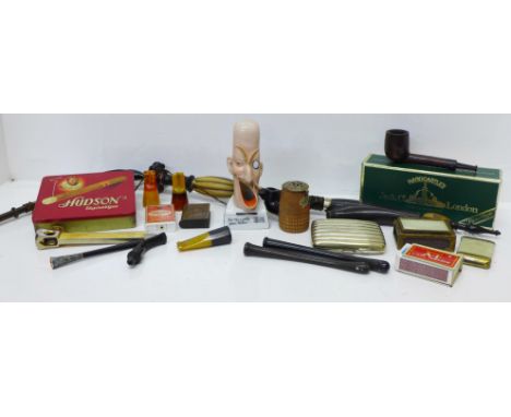 Smoking related items; a large Victorian carved wood/horn pipe, a/f, a Hardcastles pipe, a porcelain comical gentleman's head