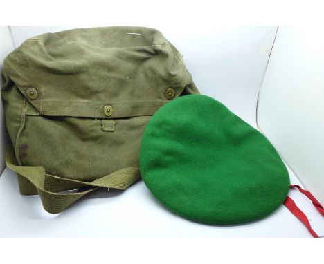 A WWII US Army lightweight service mask bag and a beret 