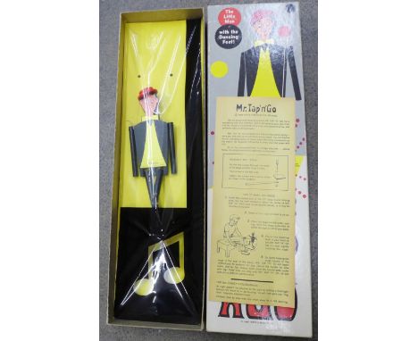 A Mr. Tap n Go puppet, boxed 