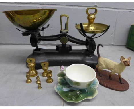 A pair of Librasco kitchen scales, a Franz china frog cup and saucer set and a figure of a Siamese cat 