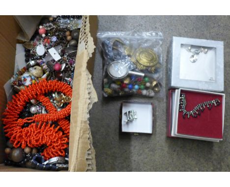 A collection of jewellery and other items including a compass and brass Police badge 