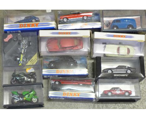 A box of die-cast vehicles including Dinky 1948 Tucker Torpedo, 1957 Chevrolet Bel Air, Cadillac Coupe De Ville and Minichamp