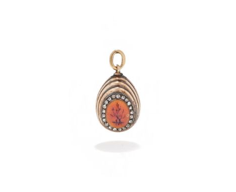 FABERGÉ, AN ENAMEL AND DIAMOND SET EGG PENDANT WORKMASTER MIKHAIL PERKHIN, ST. PETERSBURG PRE-1899 The front and back enamell