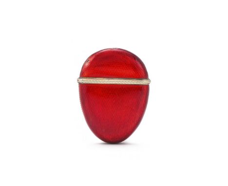 FABERGÉ, AN IMPERIAL SILVER GILT AND RED ENAMEL VESTA CASE WORKMASTER HENRIK WIGSTRÖM, ST. PETERSBURG 1908-1917 The hinged eg