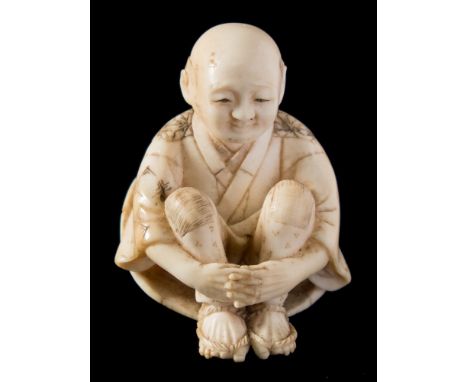 A Japanese carved ivory netsuke, signed Ikkoku: of a smiling peasant seated in a large conical straw hat, signed to red lacqu