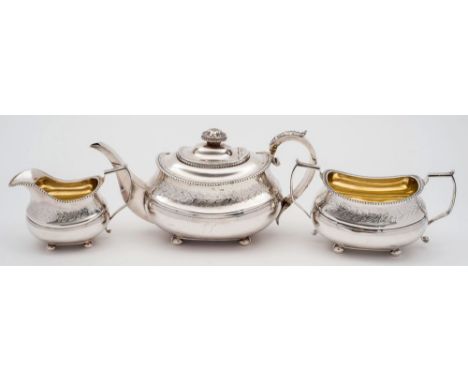 A George III silver three-piece silver tea service, maker Thomas & George Hayter, London, 1818/19: crested and initialled, of