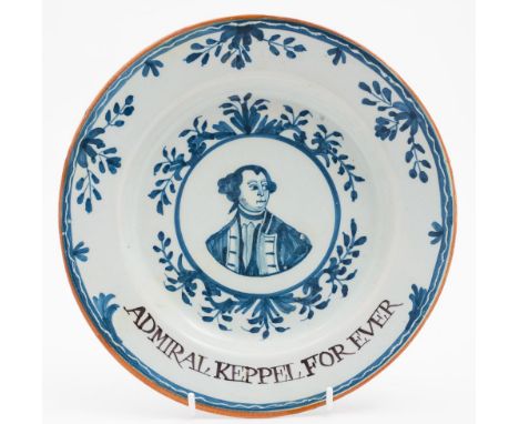 A London delftware 'Admiral Keppel' plate: painted in blue with a head and shoulders portrait of the admiral within a circula