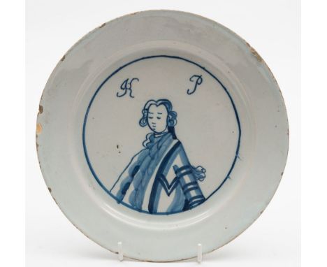A Bristol blue and white delftware 'King of Prussia' plate: painted with a half length portrait of Frederick the Great below 