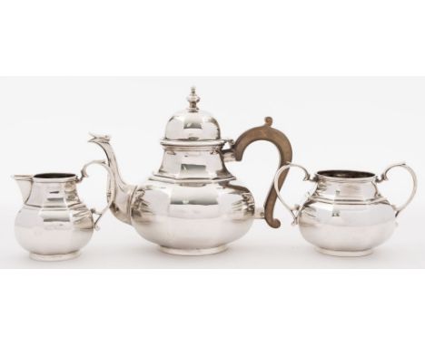 A George V silver three-piece tea service, maker Nayler Brothers, London, 1917: of octagonal baluster form and circular foot,