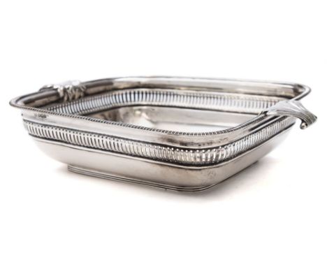 An early 20th century silver dish, maker George Howson, Sheffield, 1929: of rectangular form with a reeded edge and pierced b