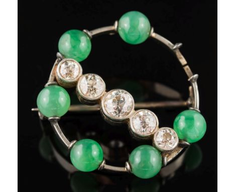A jade and diamond circular brooch: set with a surround of jade beads each approximately 6mm diameter and a single row of gra