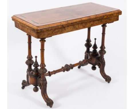 A Victorian burr walnut and inlaid rectangular card table:, bordered with boxwood and ebony lines, the baize lined quarter ve