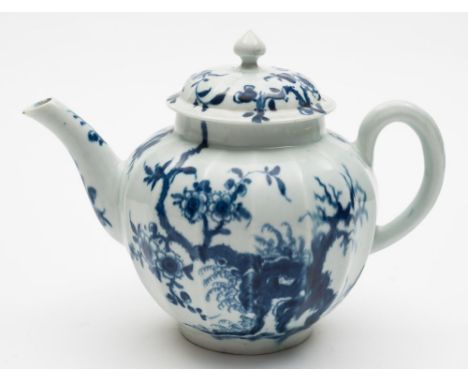 A First Period Worcester porcelain teapot: of fluted form painted in blue in the Prunus Root pattern, workmans mark, circa 17