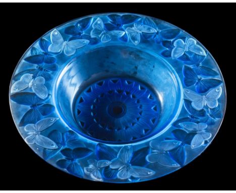 A Lalique shallow bowl 'Phalènes': the blue glass body moulded and intaglio decorated under the rim with butterflies, the cen