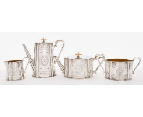 A Victorian  silver four-piece tea service, maker Walter & Charles Sissons, London, 1889: crested and initialled, of oval car