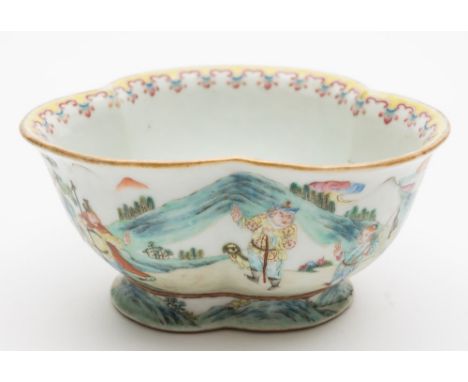 A Chinese famille rose trefoil bowl: the exterior painted with a continuous hunting scene in a mountain landscape, the interi