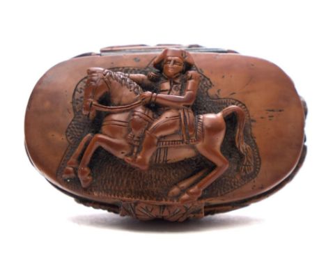A Continental boxwood cartouche-shaped snuff box: the cover  carved in high relief with the figure of Napoleon on horseback, 