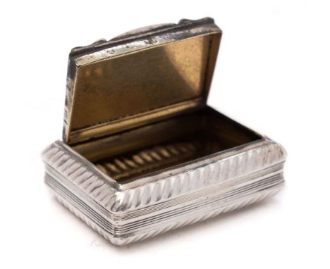 A Georgian silver rectangular snuff box, all marks worn: of rectangular outline, with engine turned and gadrooned decoration,