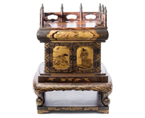 A Japanese calamander, metal mounted and gilt lacquered Kodansu: of rectangular form on scroll feet and platform base with ga